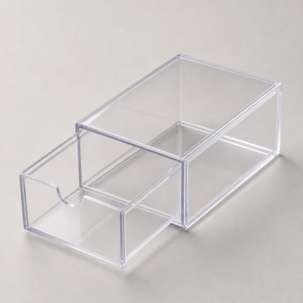 Clear plastic slide-out drawer box with the tray partly open